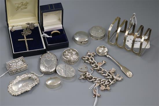 Various small silver items, including patch boxes, vesta, spirit label, charm bracelet, toast rack, etc and a yellow metal diamond ring